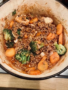 Bolognese with vegetables in pan
