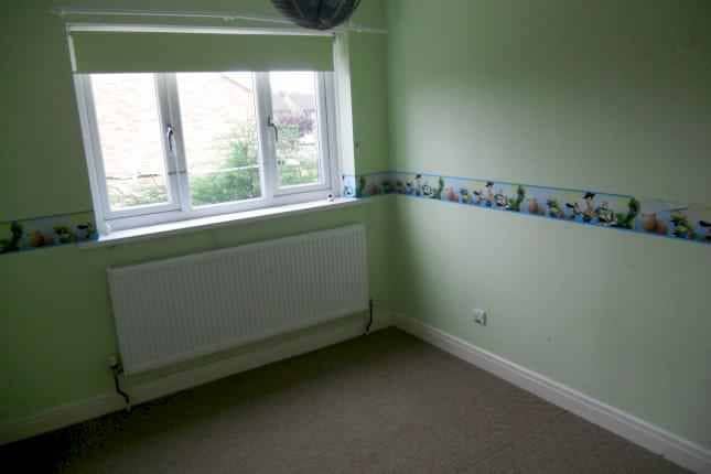 badly decorated green bedroom