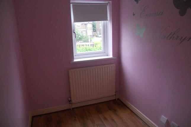 badly decorated pink bedroom